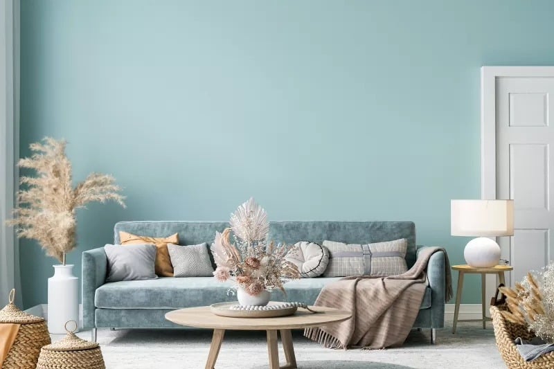 Muted teal wall paint with clean white trim finish by an interior painter in Clarksburg, MD