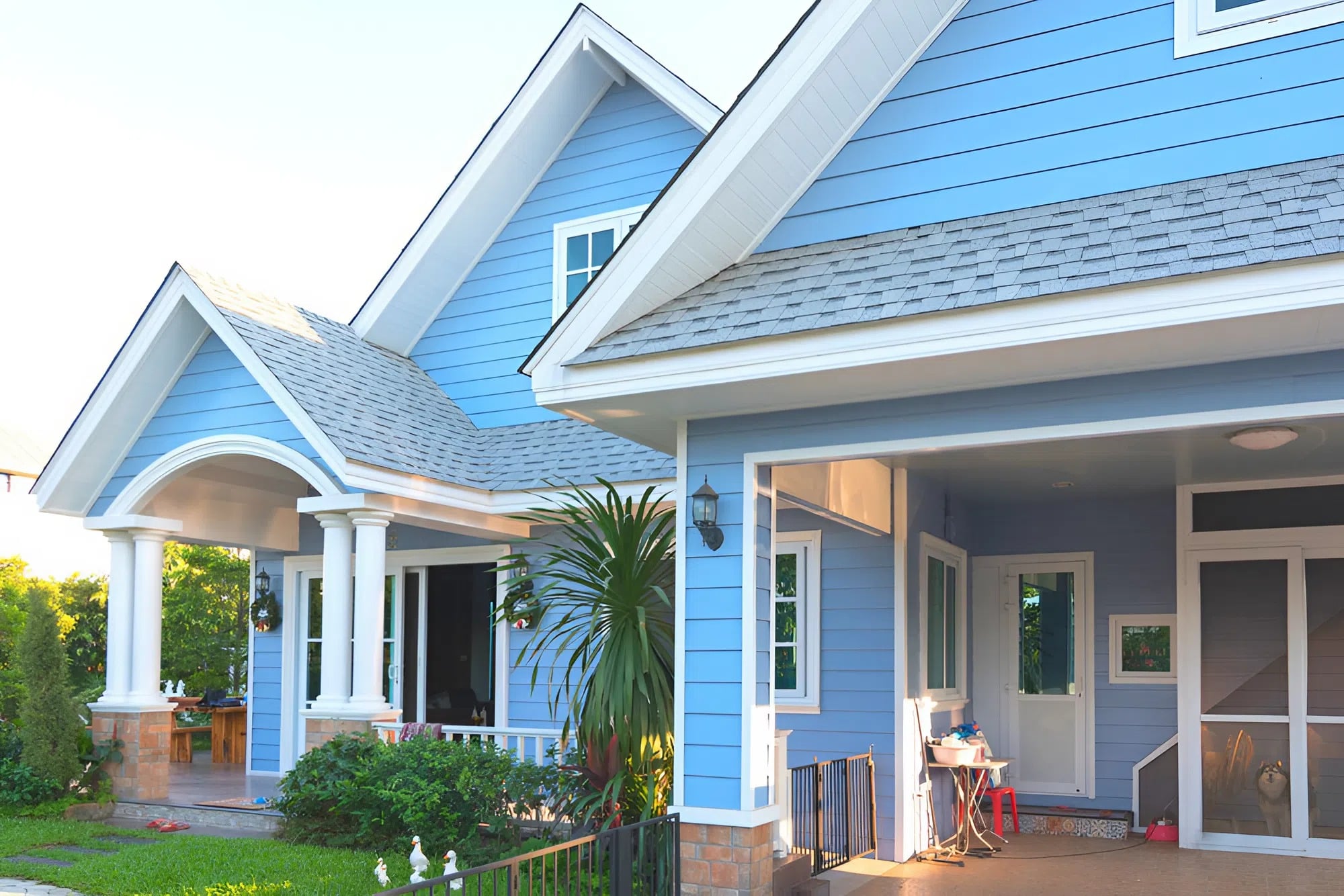 Fresh blue exterior house paint with crisp white trim and siding by an exterior painter in Frederick, MD