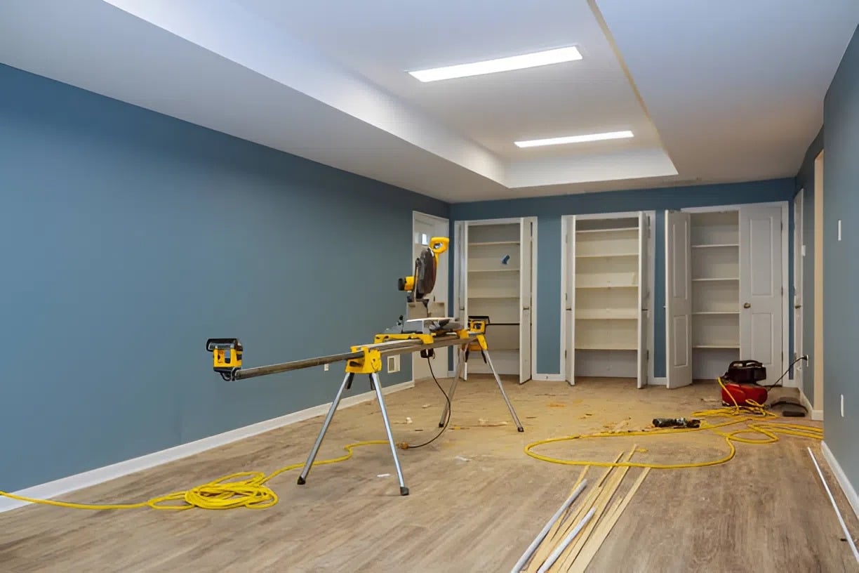Newly repaired drywall and interior painting prep with tools and trim work, completed by an interior painter in Westminster, MD
