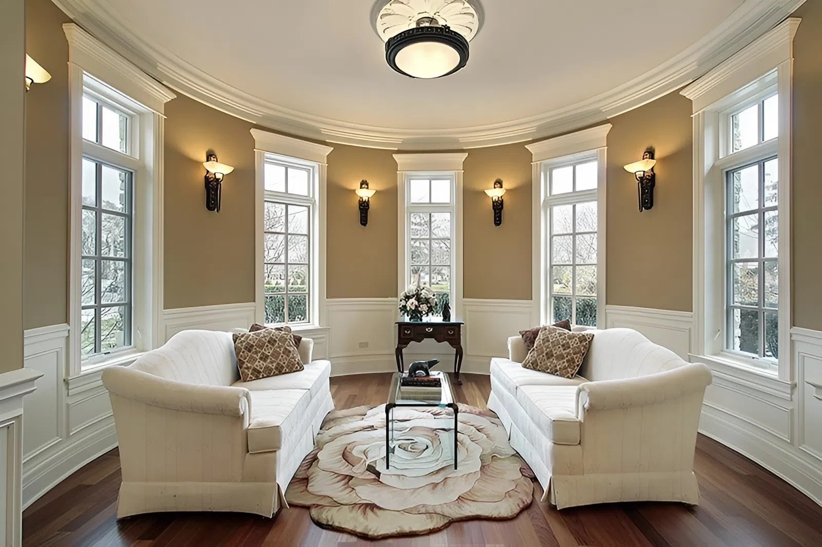 Living room with detailed crown molding and window trim by a painter in Potomac, MD