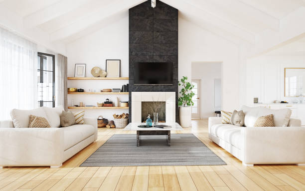 Living room with soft neutral wall paint and vaulted ceilings by a painting company in Walkersville, MD