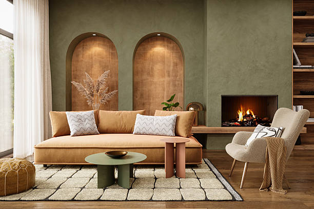 Open living room with earthy green walls and warm neutral finishes by a painting company in Clarksburg, MD.