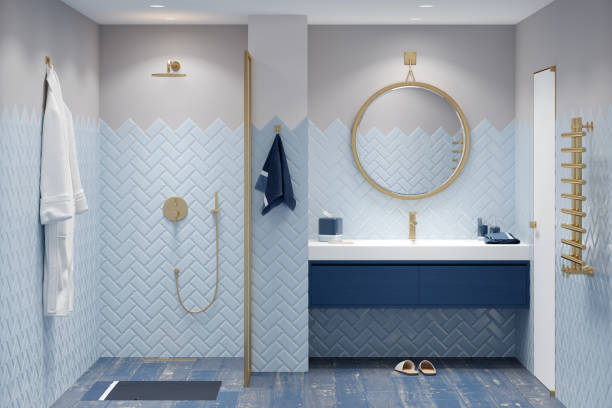 Light blue bathroom walls with a satin finish and white trim by an interior painter in Middletown, MD.